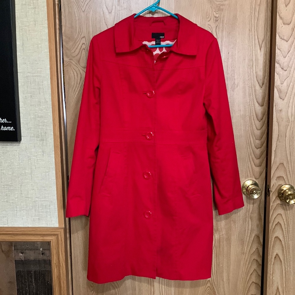 Beautiful red coat/jacket with pockets & cute red polkadot lining. Size 10